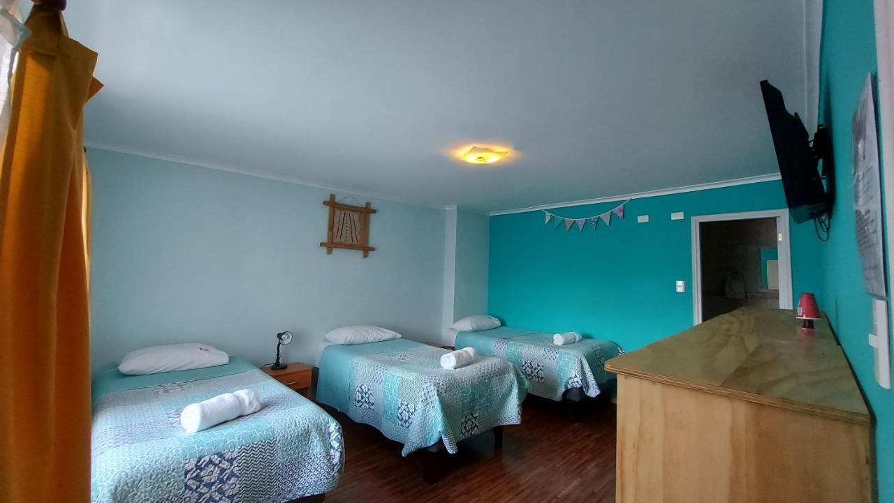 פורטו נטאלס Hostal La Base מראה חיצוני תמונה