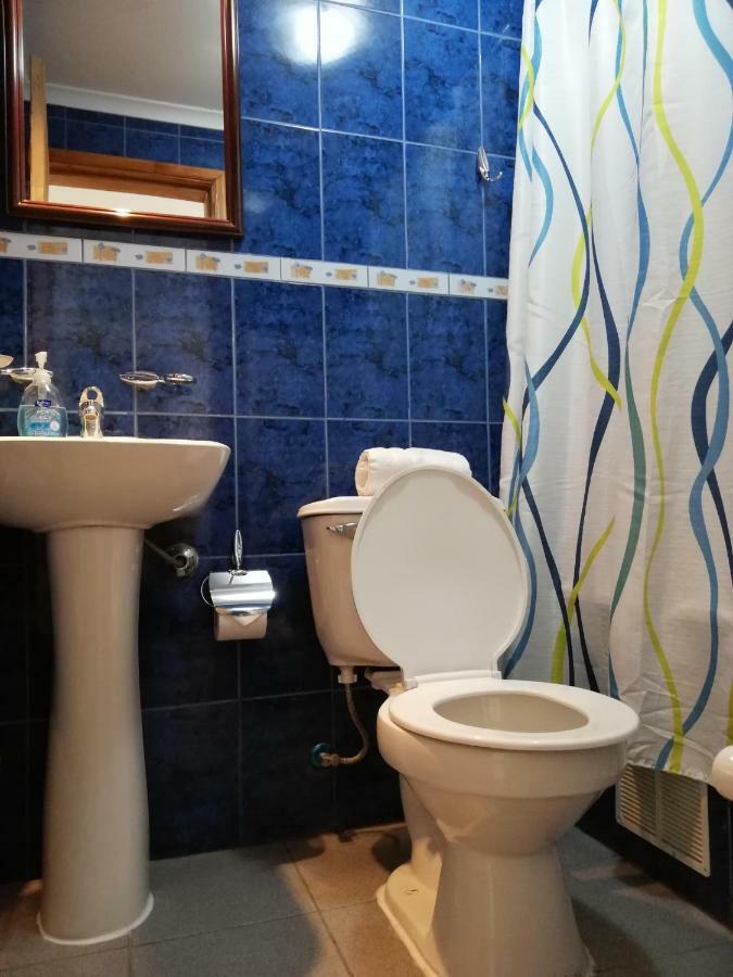 פורטו נטאלס Hostal La Base מראה חיצוני תמונה